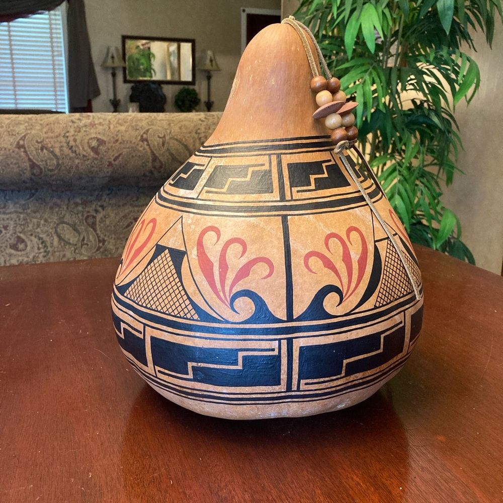 Zuni Decorated Gourd with leather cord and wooden beads signed and dated